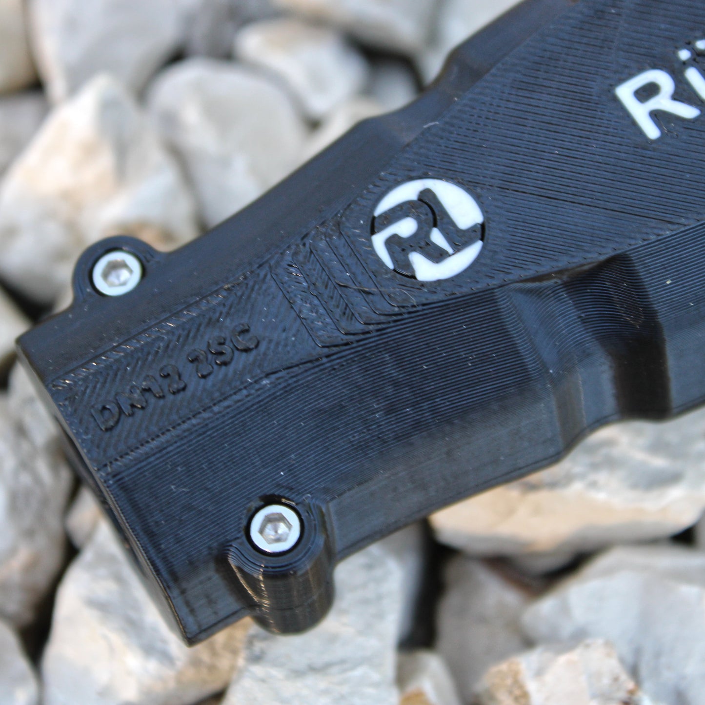 Hydraulikbeschriftung als Griff